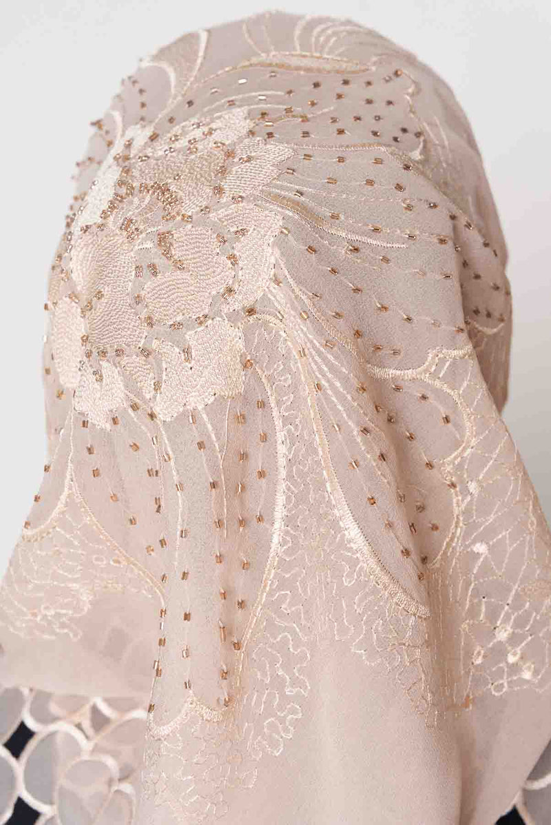 text -- beaded sand