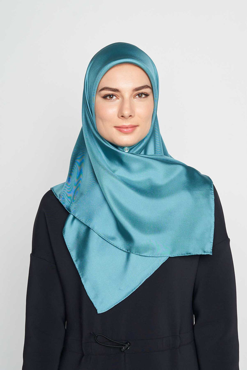 text -- shimmering teal