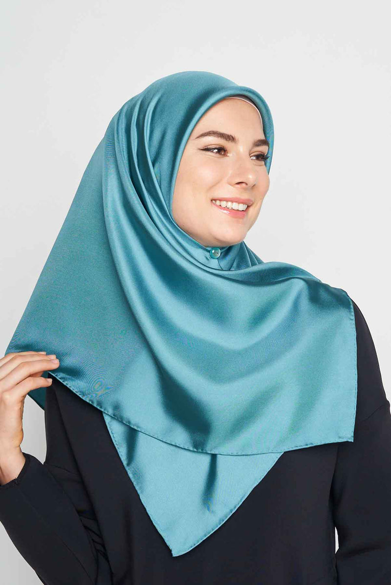 text -- shimmering teal