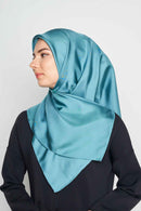 text -- shimmering teal