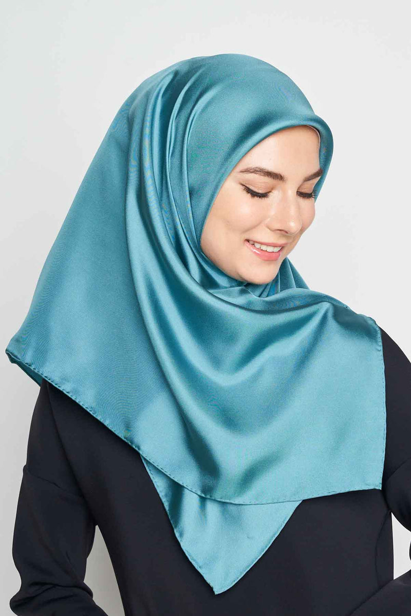 text -- shimmering teal