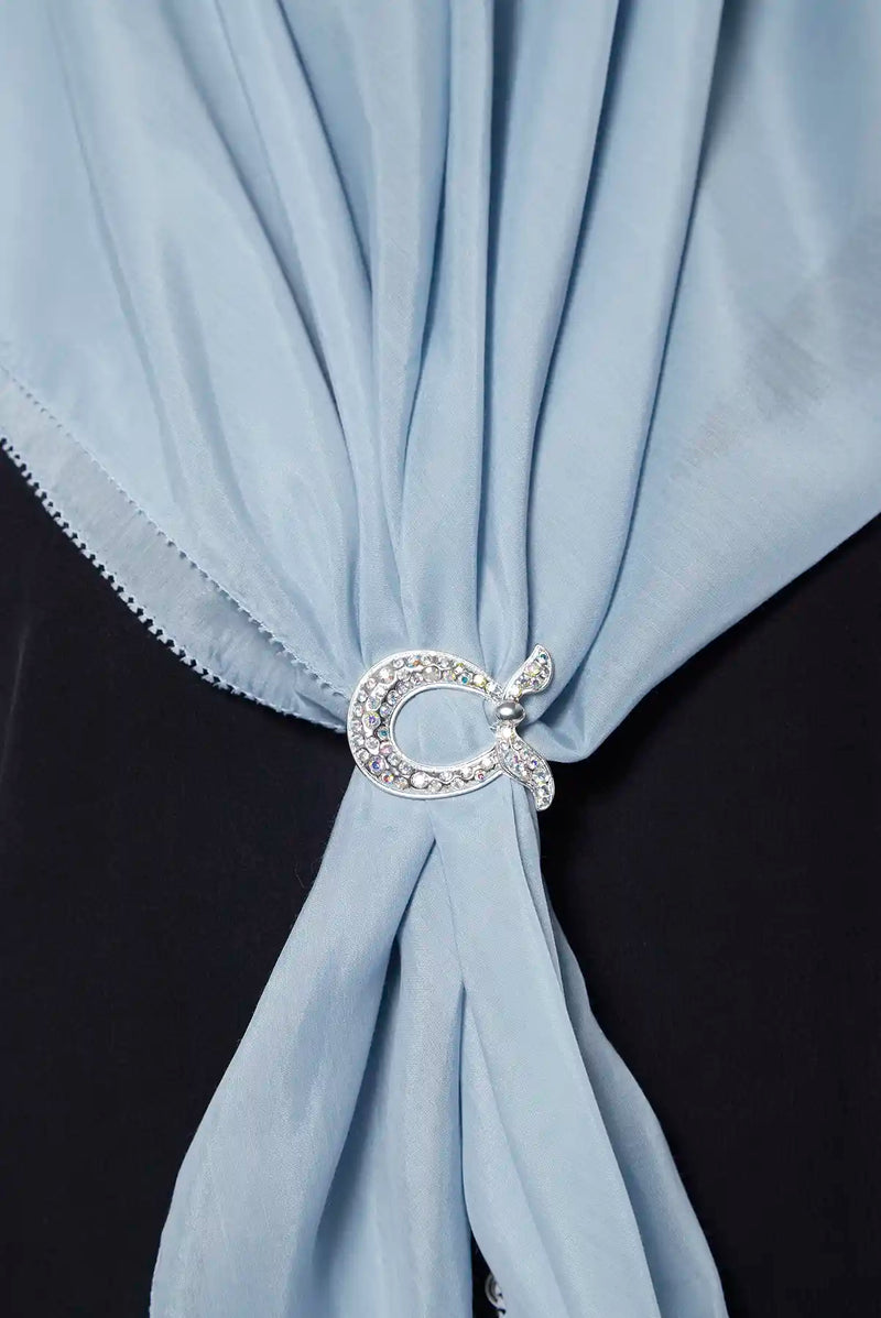 text -- brooch opalescent