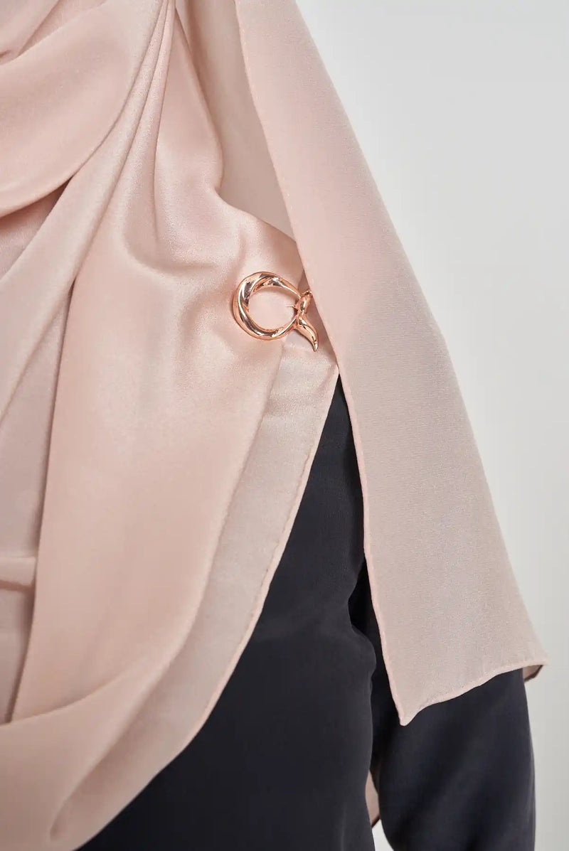 text --rose gold brooch