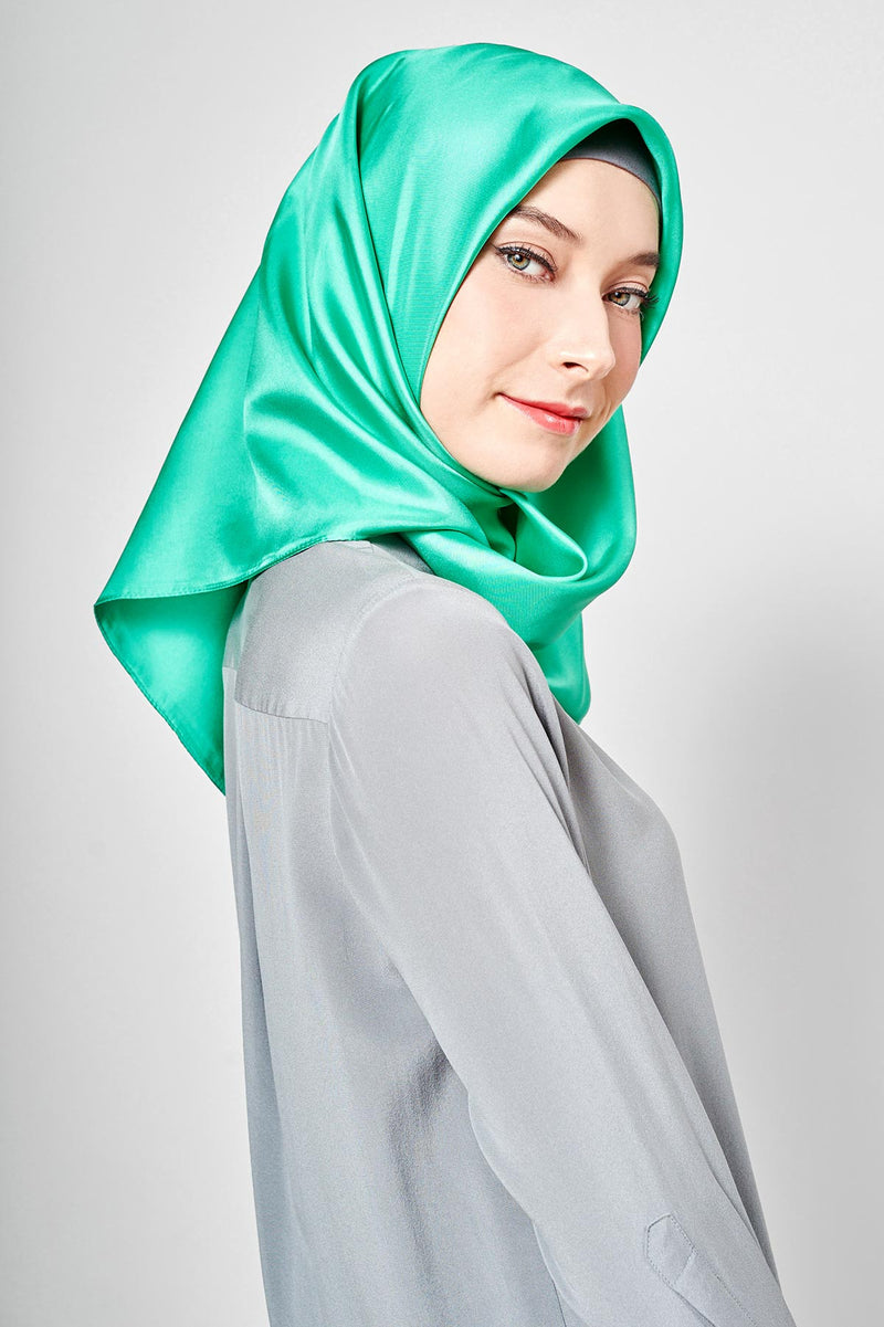 text --shimmering neon mint