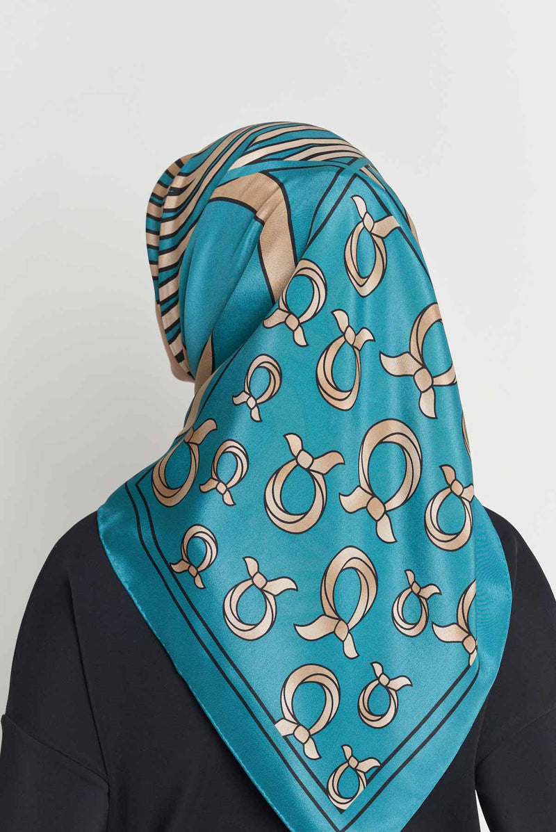 text -- arabesque really teal