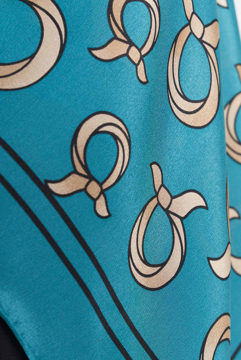 text -- arabesque really teal