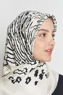 text -- shimmering thumbprint ivory