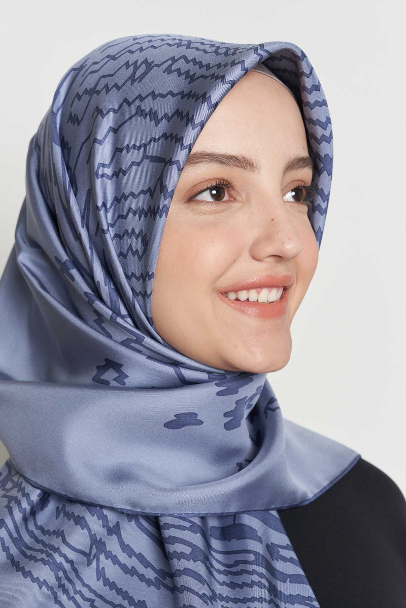text -- shimmering thumbprint stonewash blue