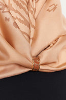 text -- shimmering thumbprint caramel
