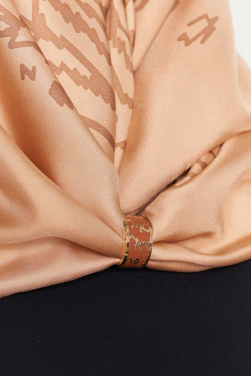 text -- shimmering thumbprint caramel