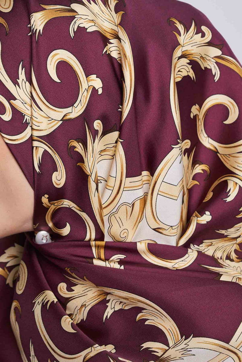 text -- twirly maroon