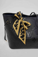 text -- gold black twilly