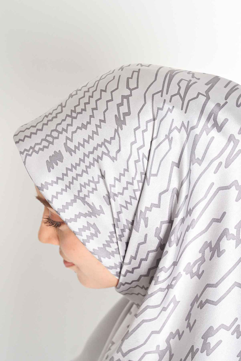 text -- shimmering thumbprint grey
