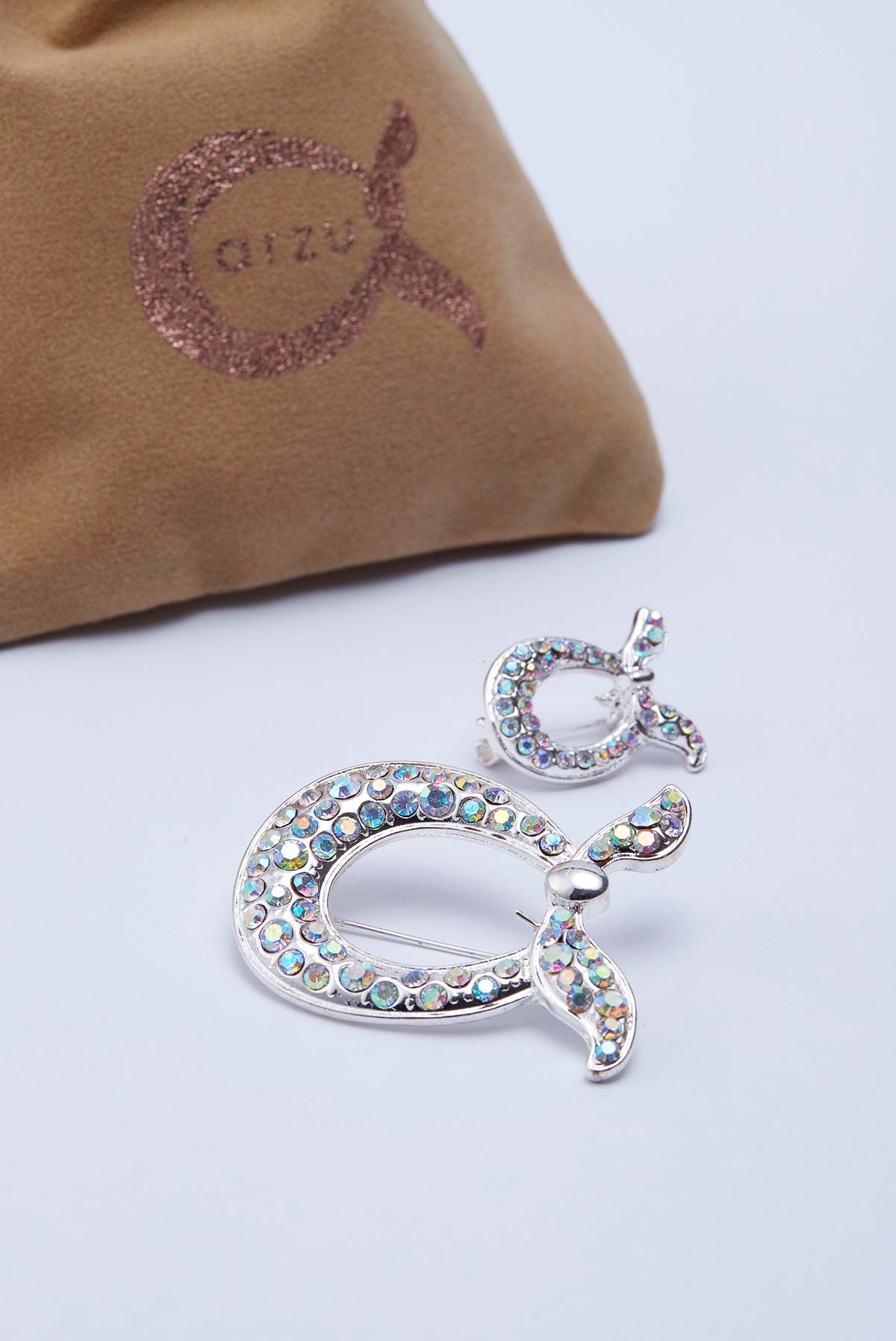 text -- brooch opalescent