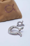 text -- brooch chrome