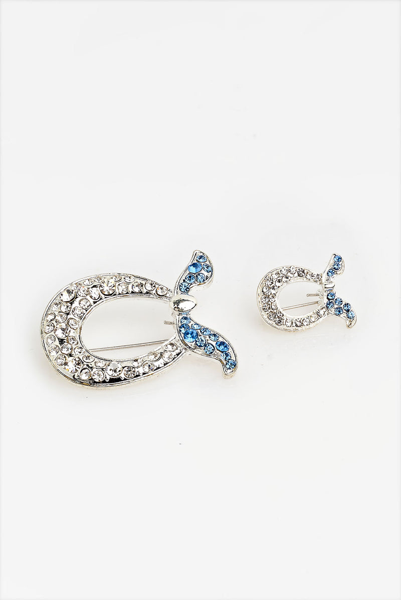 text -- brooch jet set blue