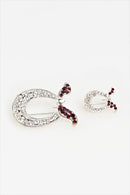 text -- brooch red