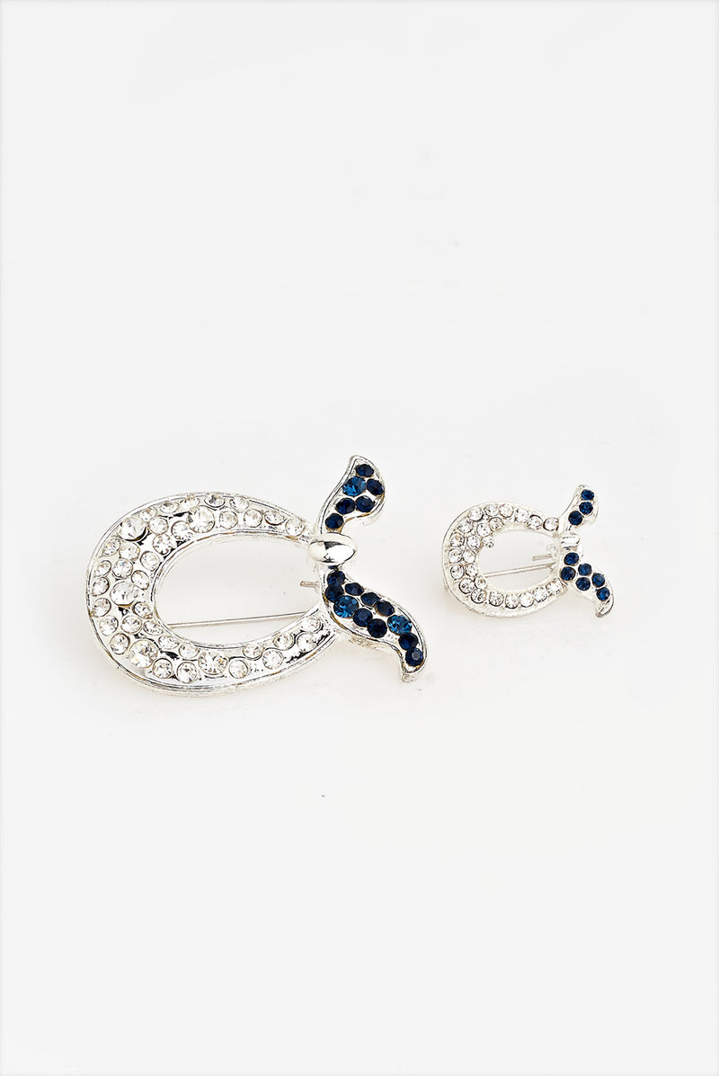 text -- brooch black blue
