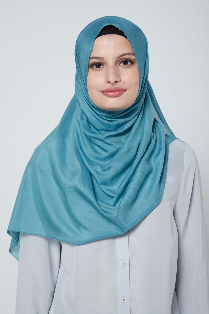 text -- lustrous smokey teal