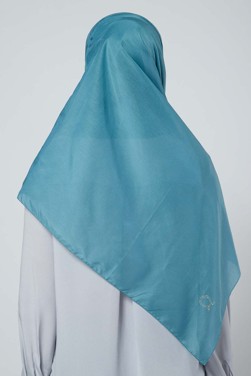 text -- lustrous smokey teal
