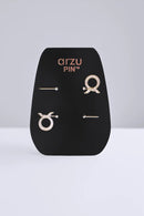 text -- gold pin