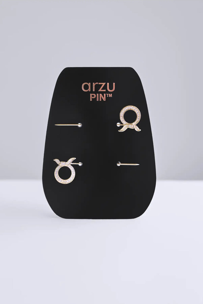 text -- gold pin